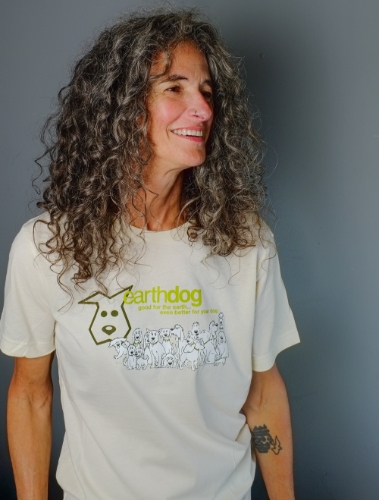 kym wears the earthdog pack t-shirt in natural in size medium